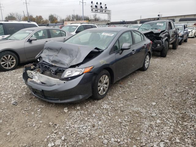 Photo 1 VIN: 19XFB2F51CE051540 - HONDA CIVIC LX 