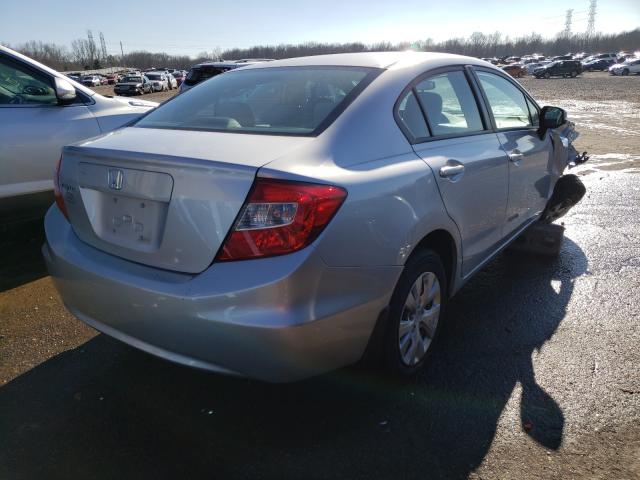 Photo 3 VIN: 19XFB2F51CE061212 - HONDA CIVIC LX 