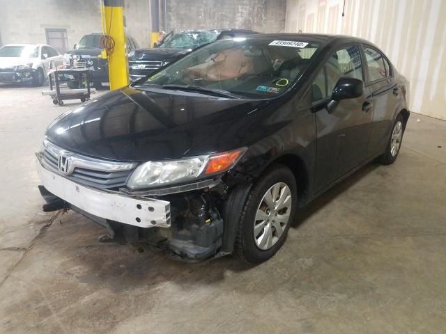 Photo 1 VIN: 19XFB2F51CE307451 - HONDA CIVIC LX 