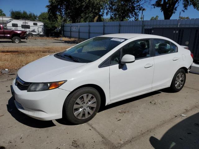 Photo 0 VIN: 19XFB2F51CE370615 - HONDA CIVIC LX 