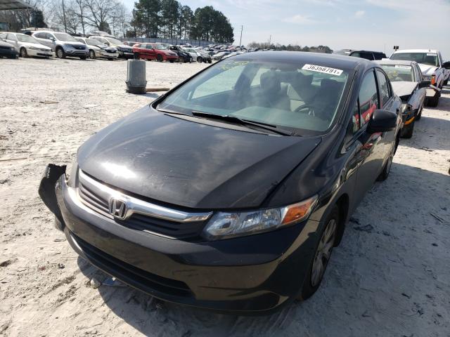 Photo 1 VIN: 19XFB2F51CE388337 - HONDA CIVIC LX 