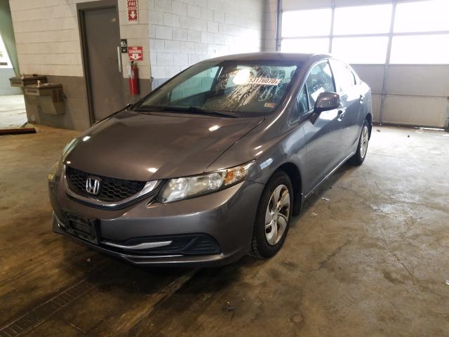 Photo 1 VIN: 19XFB2F51DE030799 - HONDA CIVIC LX 