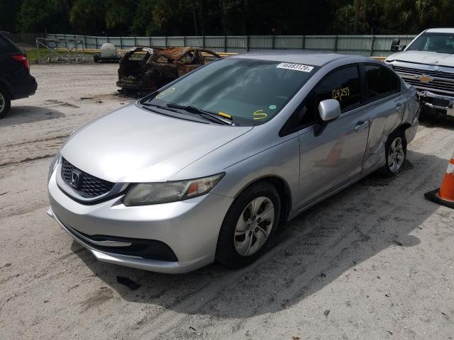 Photo 1 VIN: 19XFB2F51DE049613 - HONDA CIVIC LX 