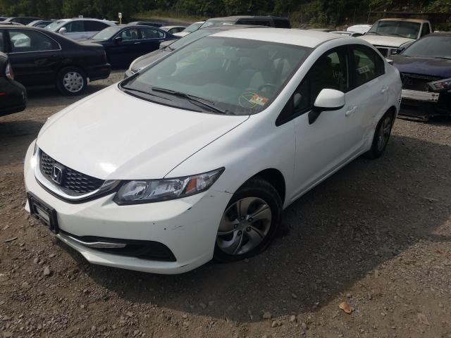 Photo 1 VIN: 19XFB2F51DE247527 - HONDA CIVIC LX 