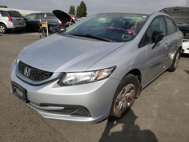 Photo 1 VIN: 19XFB2F51DE250427 - HONDA CIVIC LX 