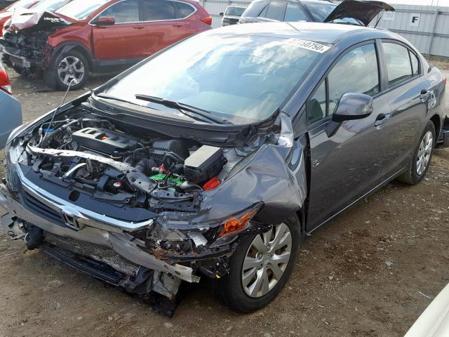 Photo 1 VIN: 19XFB2F52CE007823 - HONDA CIVIC LX 