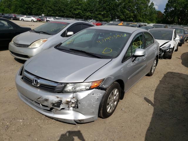 Photo 1 VIN: 19XFB2F52CE015274 - HONDA CIVIC LX 