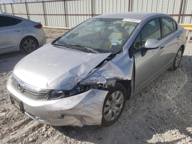 Photo 1 VIN: 19XFB2F52CE015453 - HONDA CIVIC LX 