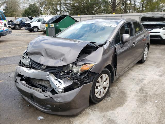 Photo 1 VIN: 19XFB2F52CE062515 - HONDA CIVIC LX 