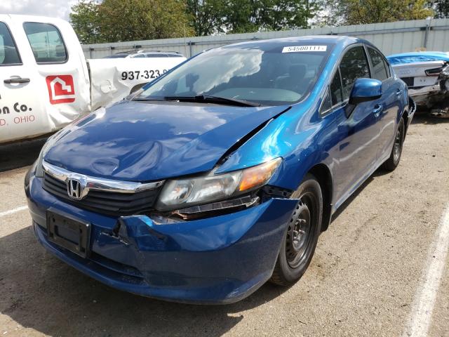 Photo 1 VIN: 19XFB2F52CE066421 - HONDA CIVIC LX 