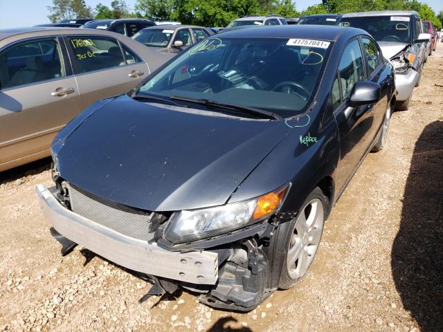 Photo 1 VIN: 19XFB2F52CE077158 - HONDA CIVIC LX 