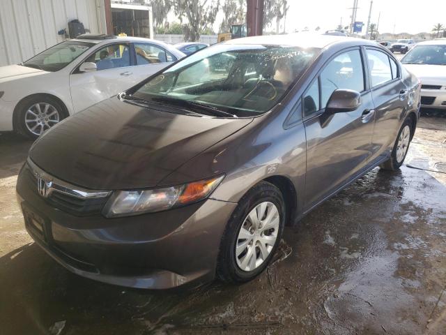 Photo 1 VIN: 19XFB2F52CE328762 - HONDA CIVIC LX 