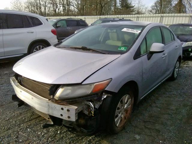 Photo 1 VIN: 19XFB2F52CE343570 - HONDA CIVIC LX 