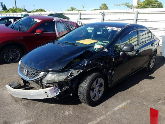 Photo 1 VIN: 19XFB2F52DE204959 - HONDA CIVIC LX 