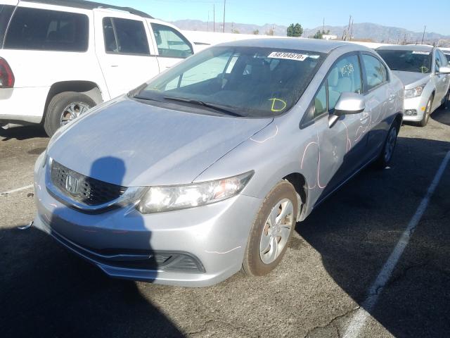 Photo 1 VIN: 19XFB2F52DE295411 - HONDA CIVIC LX 