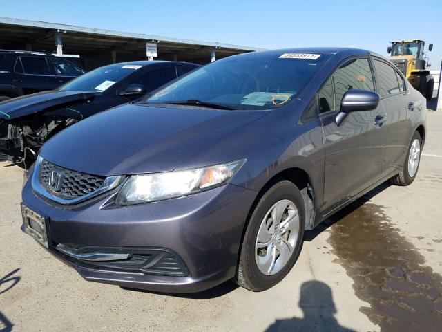 Photo 1 VIN: 19XFB2F52EE269568 - HONDA CIVIC LX 