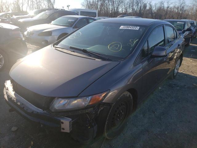 Photo 1 VIN: 19XFB2F53CE010262 - HONDA CIVIC LX 