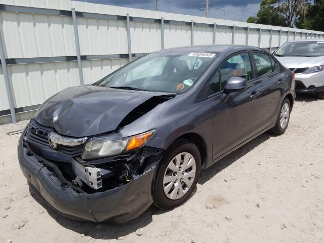 Photo 1 VIN: 19XFB2F53CE072244 - HONDA CIVIC LX 