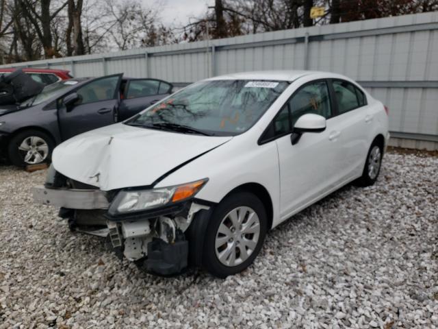 Photo 1 VIN: 19XFB2F53CE093143 - HONDA CIVIC LX 