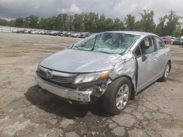 Photo 1 VIN: 19XFB2F53CE094339 - HONDA CIVIC LX 