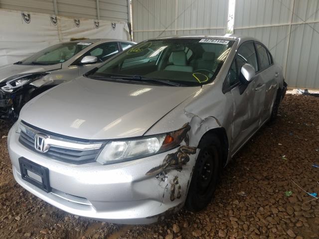 Photo 1 VIN: 19XFB2F53CE104268 - HONDA CIVIC LX 