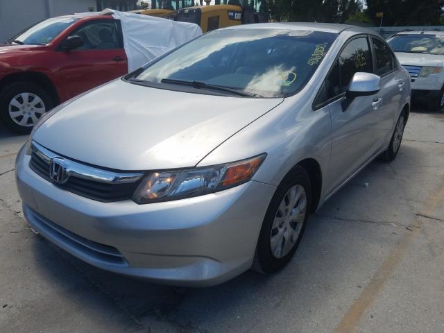 Photo 1 VIN: 19XFB2F53CE107591 - HONDA CIVIC LX 