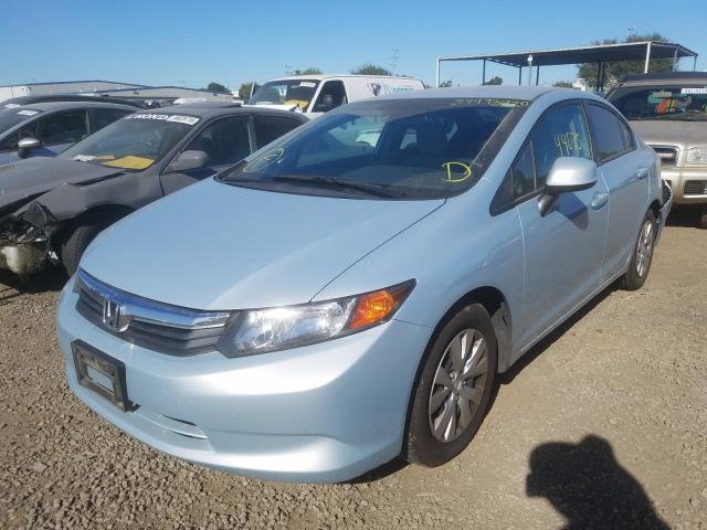 Photo 1 VIN: 19XFB2F53CE316300 - HONDA CIVIC LX 