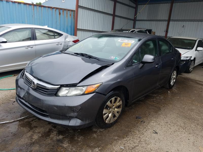 Photo 1 VIN: 19XFB2F53CE320511 - HONDA CIVIC LX 