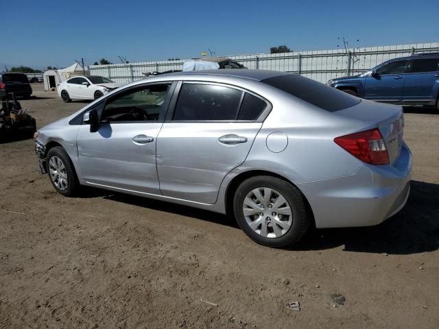 Photo 1 VIN: 19XFB2F53CE344033 - HONDA CIVIC LX 