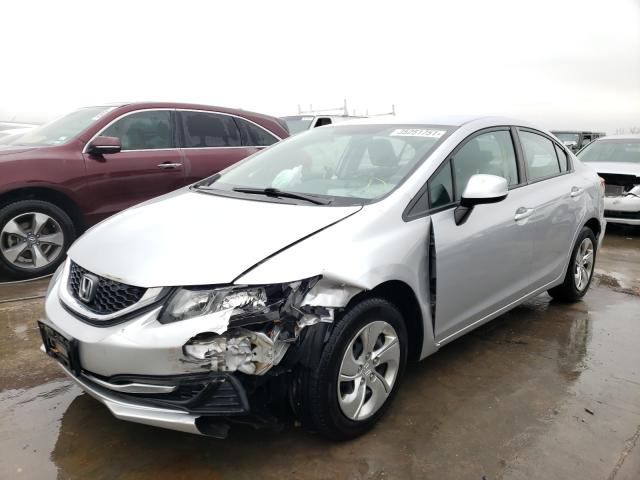 Photo 1 VIN: 19XFB2F53DE079650 - HONDA CIVIC LX 