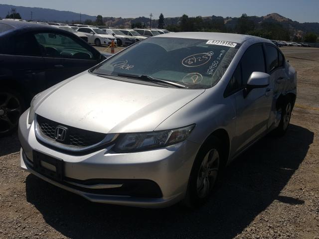 Photo 1 VIN: 19XFB2F53DE250414 - HONDA CIVIC LX 