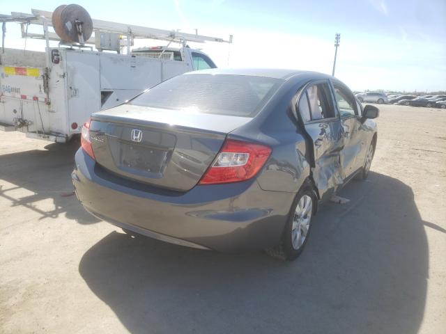 Photo 3 VIN: 19XFB2F54CE028527 - HONDA CIVIC LX 