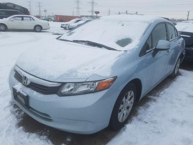 Photo 1 VIN: 19XFB2F54CE075394 - HONDA CIVIC LX 