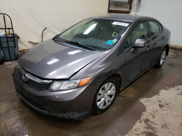 Photo 1 VIN: 19XFB2F54CE076609 - HONDA CIVIC LX 