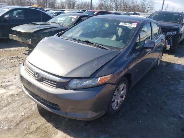 Photo 1 VIN: 19XFB2F54CE077162 - HONDA CIVIC LX 