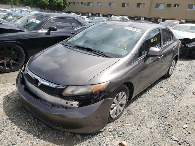 Photo 1 VIN: 19XFB2F54CE089263 - HONDA CIVIC LX 