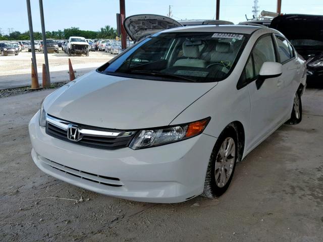 Photo 1 VIN: 19XFB2F54CE089327 - HONDA CIVIC LX 