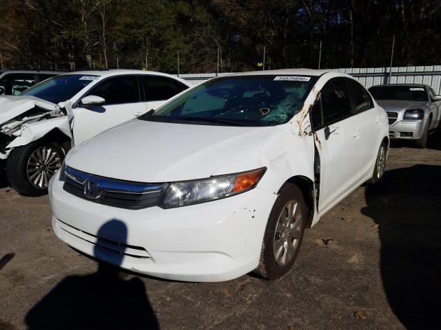 Photo 1 VIN: 19XFB2F54CE093801 - HONDA CIVIC LX 