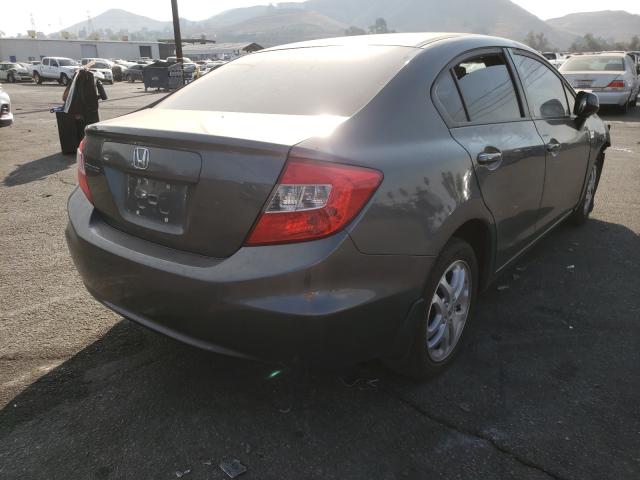 Photo 3 VIN: 19XFB2F54CE302003 - HONDA CIVIC LX 