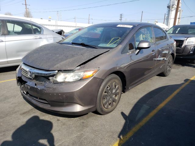 Photo 1 VIN: 19XFB2F54CE306939 - HONDA CIVIC LX 