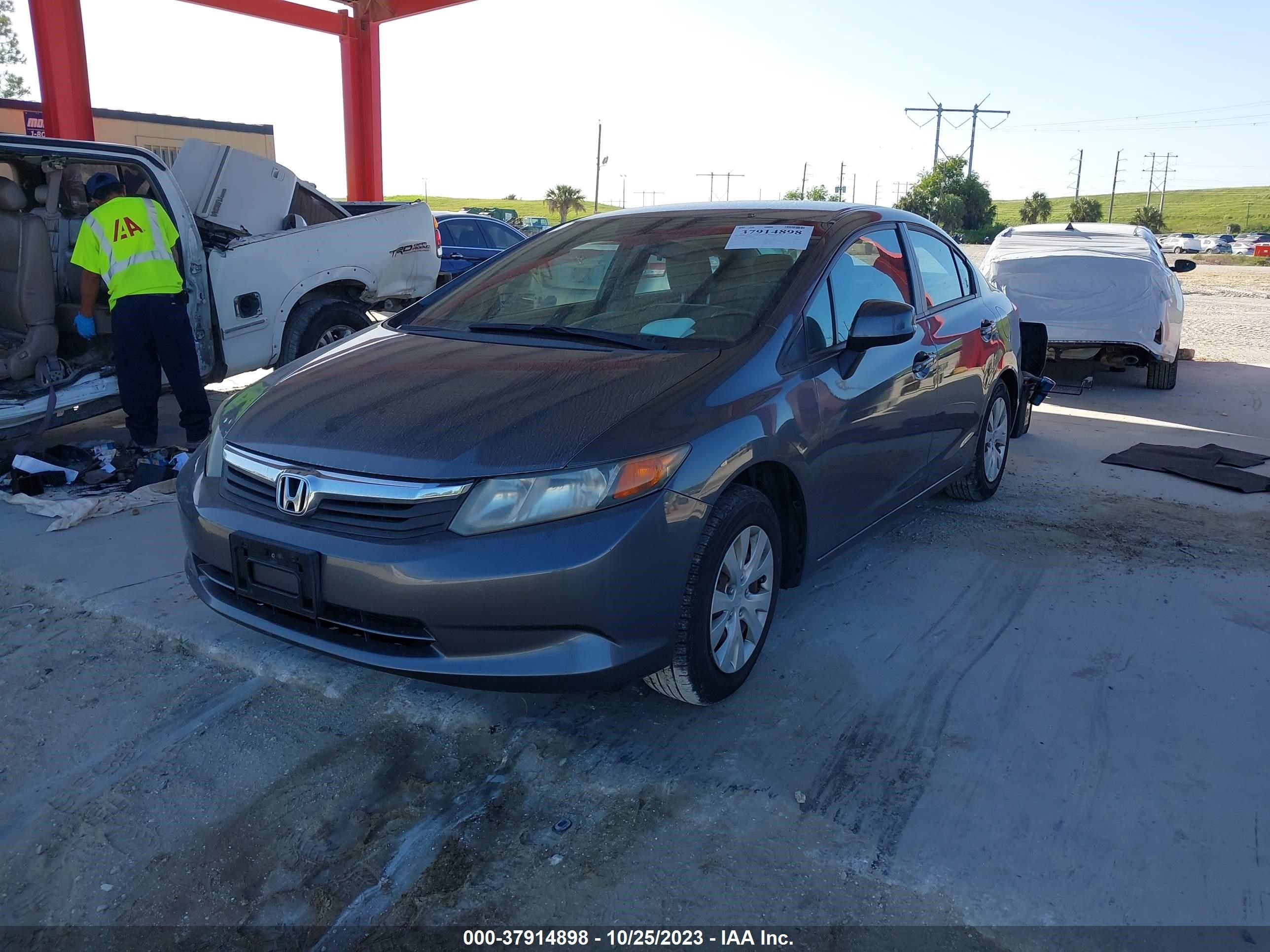 Photo 1 VIN: 19XFB2F54CE307198 - HONDA CIVIC 