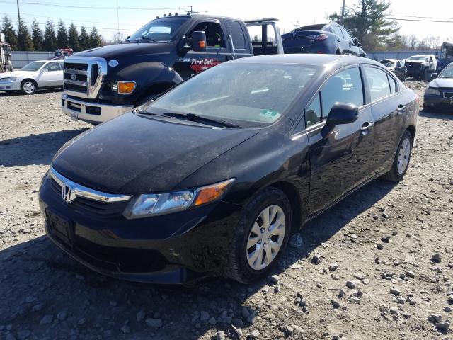 Photo 1 VIN: 19XFB2F54CE368874 - HONDA CIVIC LX 