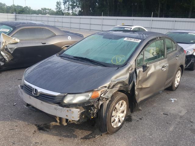 Photo 1 VIN: 19XFB2F54CE371869 - HONDA CIVIC LX 