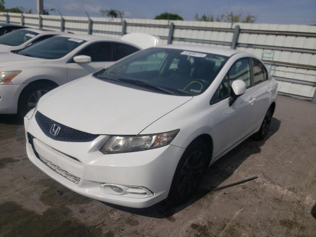 Photo 1 VIN: 19XFB2F54DE062792 - HONDA CIVIC LX 