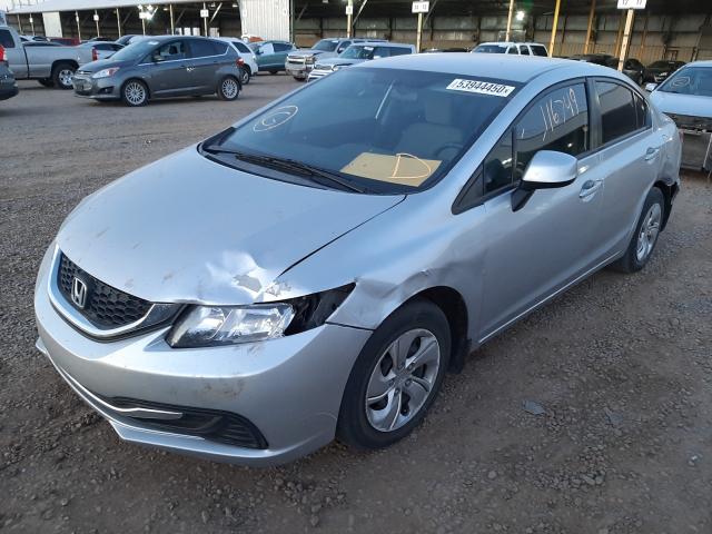 Photo 1 VIN: 19XFB2F54DE078779 - HONDA CIVIC LX 