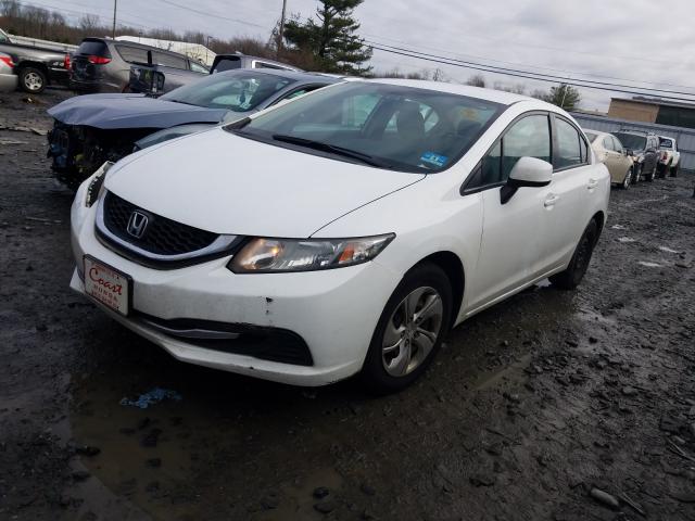 Photo 1 VIN: 19XFB2F54DE236666 - HONDA CIVIC LX 