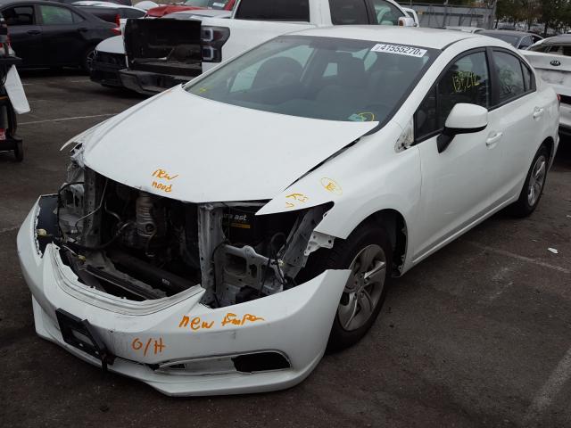 Photo 1 VIN: 19XFB2F54DE251703 - HONDA CIVIC LX 