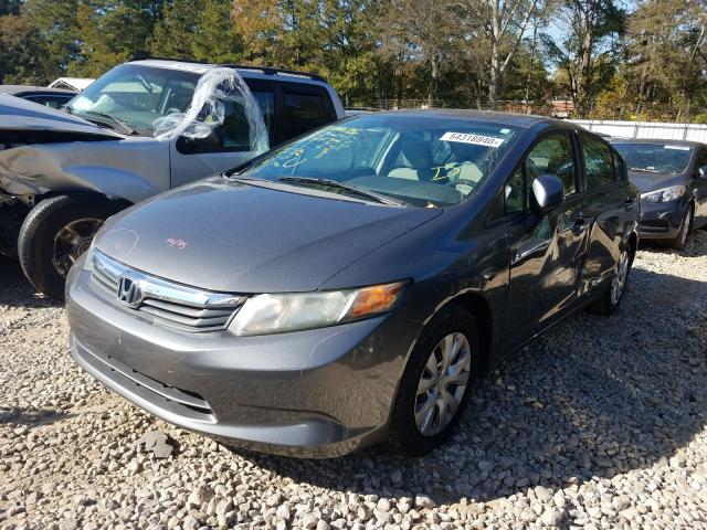 Photo 1 VIN: 19XFB2F55CE024924 - HONDA CIVIC LX 