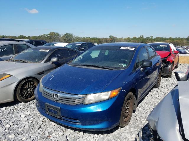 Photo 1 VIN: 19XFB2F55CE027452 - HONDA CIVIC LX 