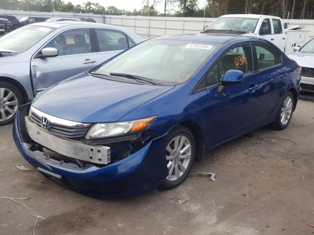 Photo 1 VIN: 19XFB2F55CE034367 - HONDA CIVIC LX 